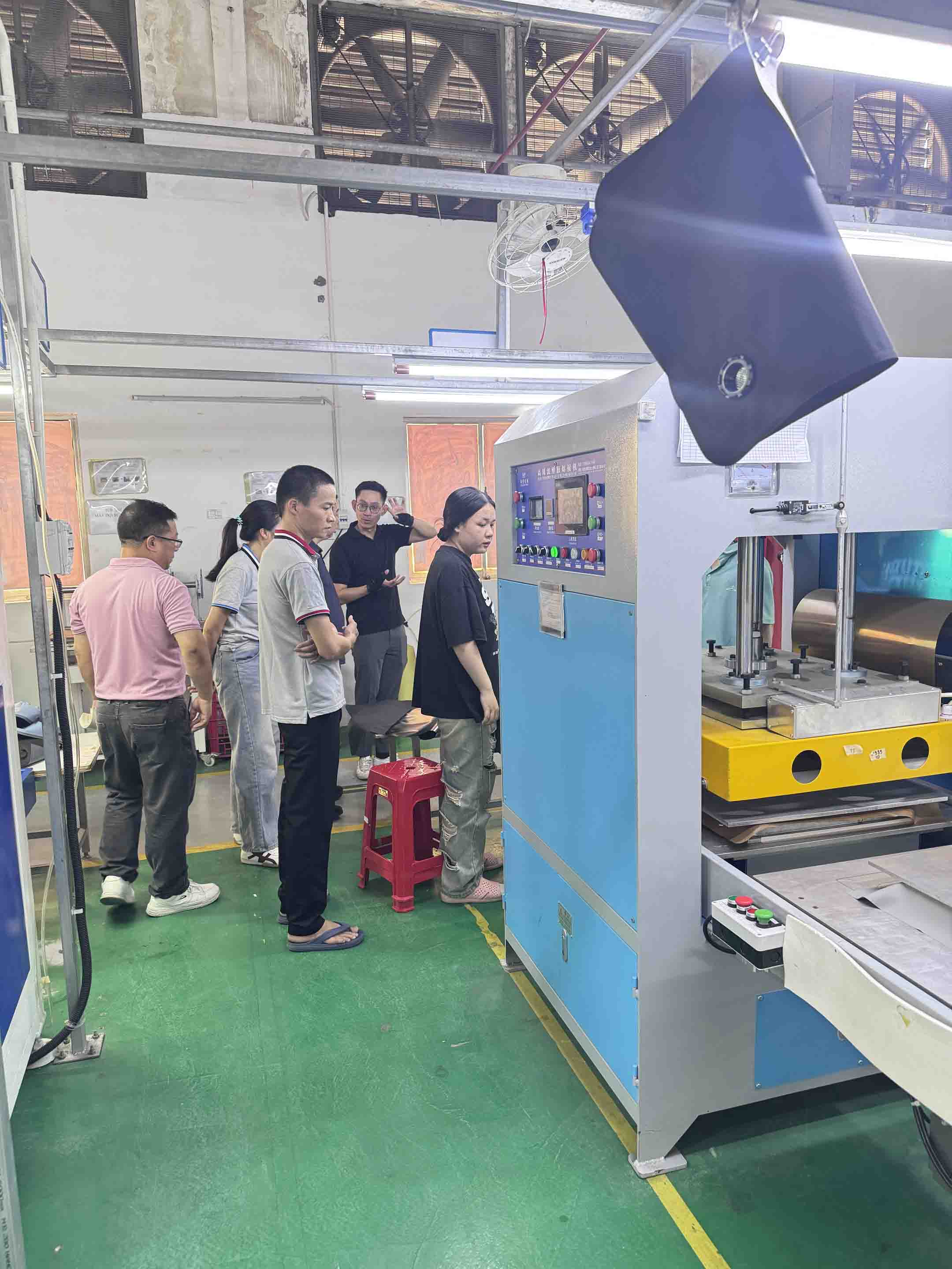 Sealock and YETI teams reviewing batch labels at the Cutting Department racks